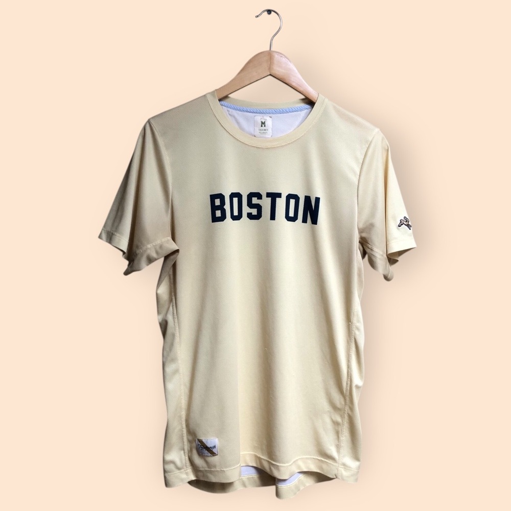 Tracksmith Boston Short Sleeve Tee in Light Beige with Navy Lettering